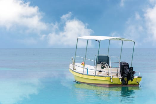 Yellow Boat On Clear Blue Sea With White Cloud, Vintage Tone