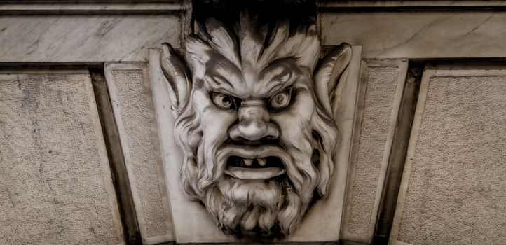 Italy, Turin. This city is famous to be a corner of two global magical triangles. This is a protective mask of stone on the top of a luxury palace entrance, dated around 1800