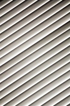 White Venetian blind background at an angle