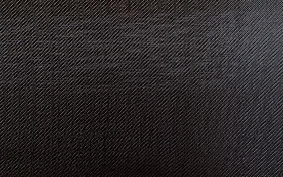 5.7 oz. 3k plain weave carbon fiber cloth background