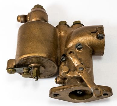 Restored antique automotive brass updraft carburetor