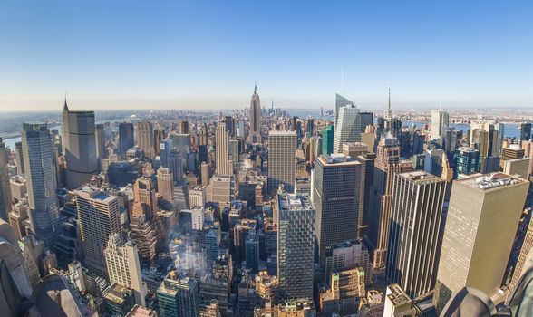 Panoramic view of building and skyscrapers in Midtown and downtown skyline of lower Manhattan, New York City, USA.