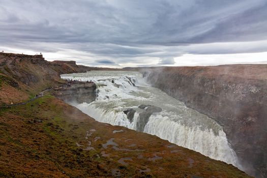 Panoramic view of Gullfoss and its canyon waterfall in a cloudy day, Iceland