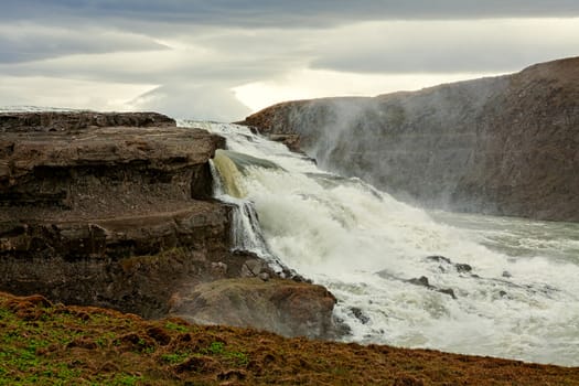 Powerful Gullfoss waterfall in a cloudy day, Iceland