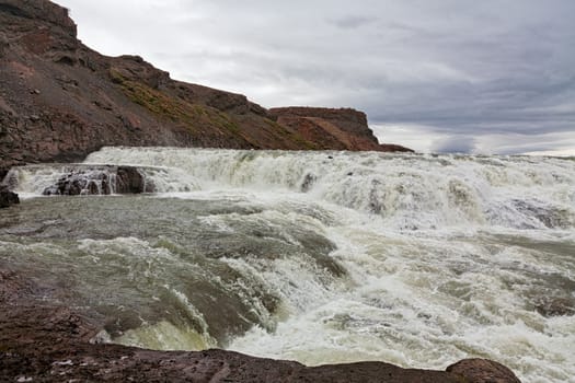Powerful Gullfoss waterfall in a cloudy day, Iceland
