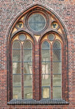 Ornamented window of a cathedral in gothic style