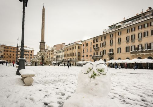 snowman in the historic Piazza Navona in Rome after the unusual snowfall of February 26, 2018