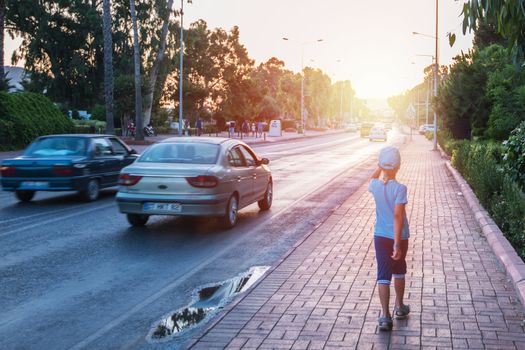 Kid boy walking at Alania city, Turkey