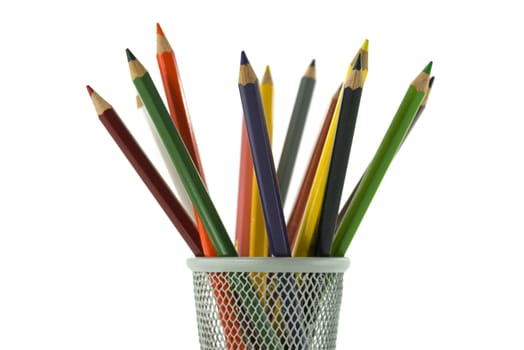 basket with pensils in red green blue yellow white and others isolated on background with text space