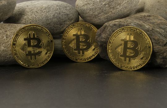 strong bitcoins golden coins , solid as a rock