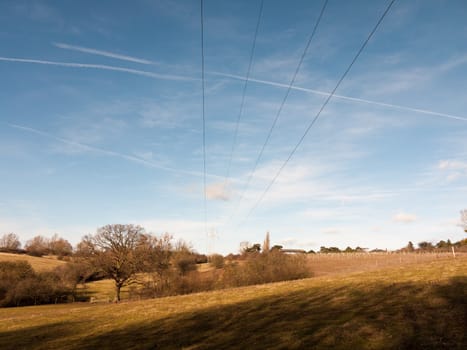 view of open green empty grass fields outside spring dedham vale landscape; essex; england; uk