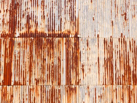 brown rusty dirty old retro metal corrugated iron shed background grunge industry; essex; england; uk