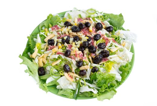 Green fresh salad with vegetables, olives, cabbage, onions, sausages for healthy fitness slim diet, isolated still life