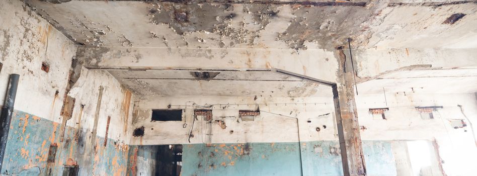 wide angle view of an old wall abandoned factory building