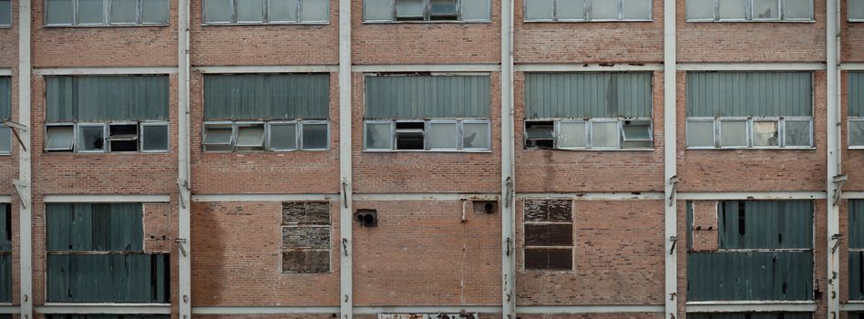 wide angle view of an old wall abandoned factory building