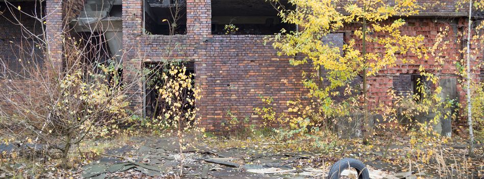 wide angle view of an old wall abandoned factory building