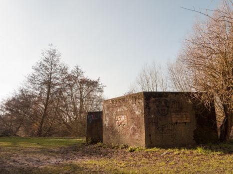 old war bunker marked graffiti no people old retro abandoned damage park public; essex; england; uk