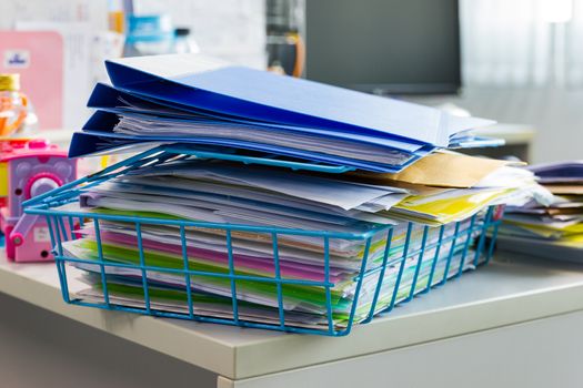 file folder and Stack of business report paper file on the table in a work office