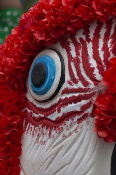 Detail of parrot puppet on the   Carnival (Carnaval) Parade.