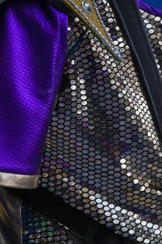 Close up view of a highly reflective texture of Carnival suit.