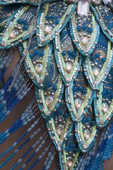 Close up view of a highly reflective texture of Carnival suit.