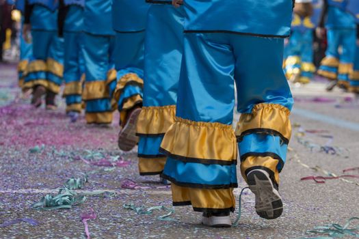 Legs of a colorful Carnival (Carnaval) Parade festival female participant