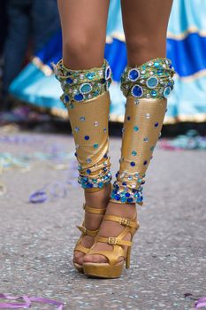 Legs of a colorful Carnival (Carnaval) Parade festival female participant