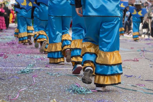 Legs of a colorful Carnival (Carnaval) Parade festival female participant