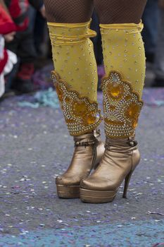 Legs of a colorful Carnival (Carnaval) Parade festival female participant