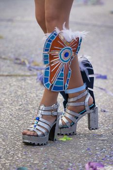 Legs of a colorful Carnival (Carnaval) Parade festival female participant