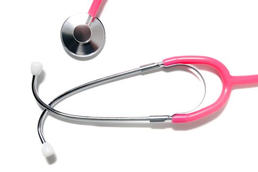 Close up view of a pink doctor's stethoscope isolated on a white background.