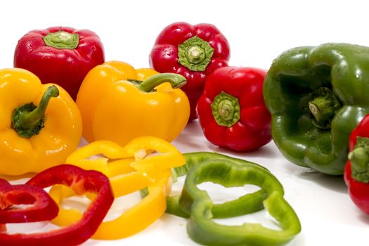 colorful bell peppers isolated on a white background.