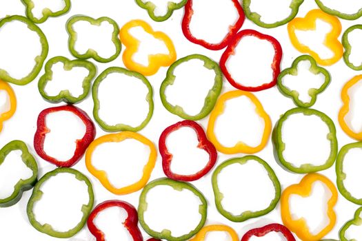 colorful sliced bell peppers isolated on a white background.