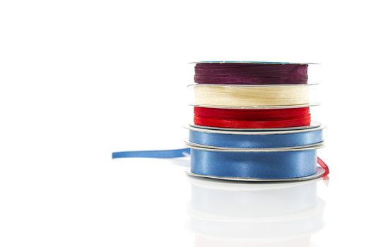 bias binding in blue red and yellow isolated on white with text space