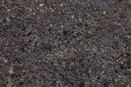 Fertile dirt soil texture ready for farming close up.