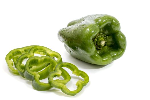 green bell peppers isolated on a white background.
