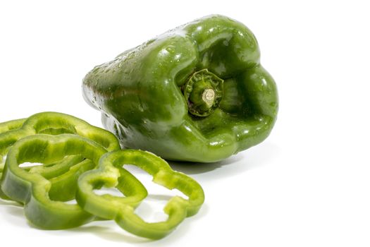 green bell peppers isolated on a white background.