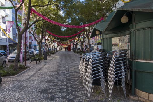 Outdoor view of the main avenue of Loule city with cobblestone artwork.