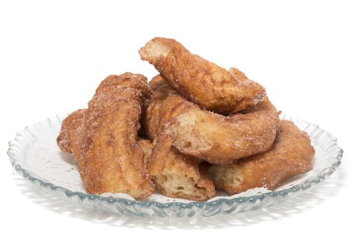 Portuguese Farturas or Spanish Churros, Fried dough sticks isolated on a white background.