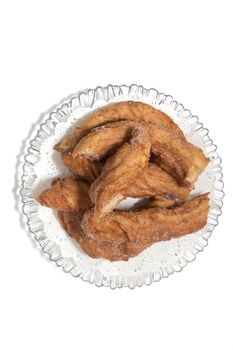 Portuguese Farturas or Spanish Churros, Fried dough sticks isolated on a white background.