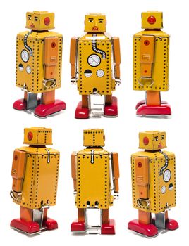 Vintage tin robot toy isolated on a white background.