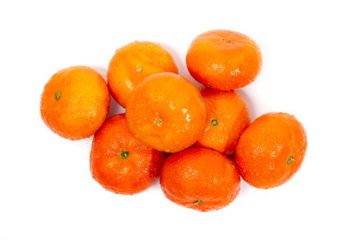 Wet clementines fruits isolated on a white background.