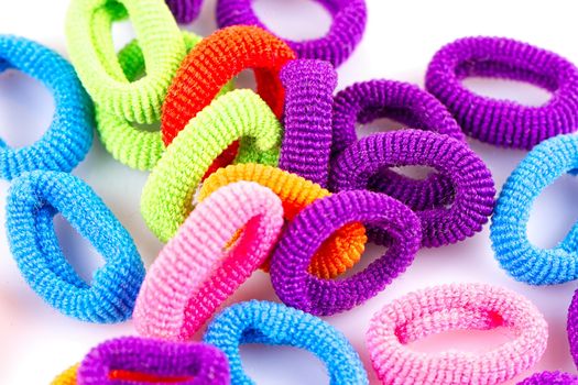 the hair multicolored rubber bands grouped close-up