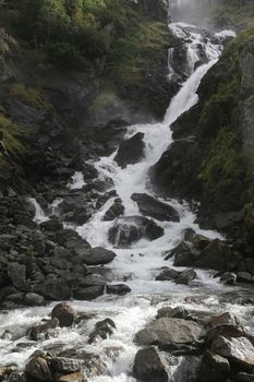 Soft water of the rough Latefossen falls in Odda Norway