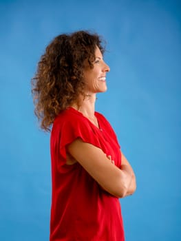 Portrait of a beautiful woman over a blue background