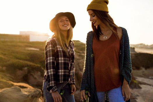 Two beautiful best friends in outdoor having fun