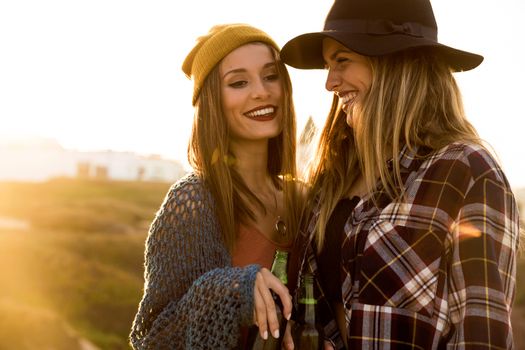 Two beautiful best friends in outdoor having fun