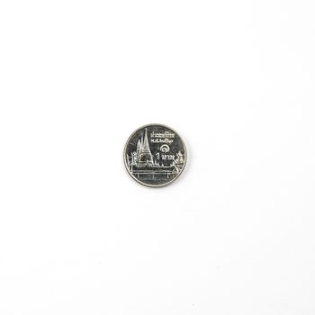 Front and rear of a Thai coin from 1 Bath on a white surface
