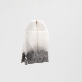 a tea bag on a white background