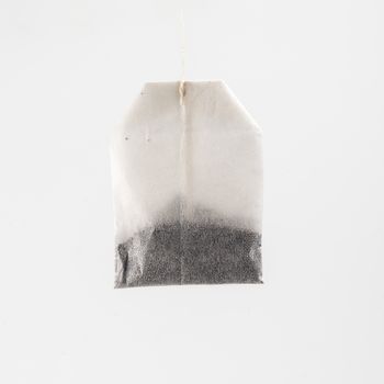 a tea bag on a white background